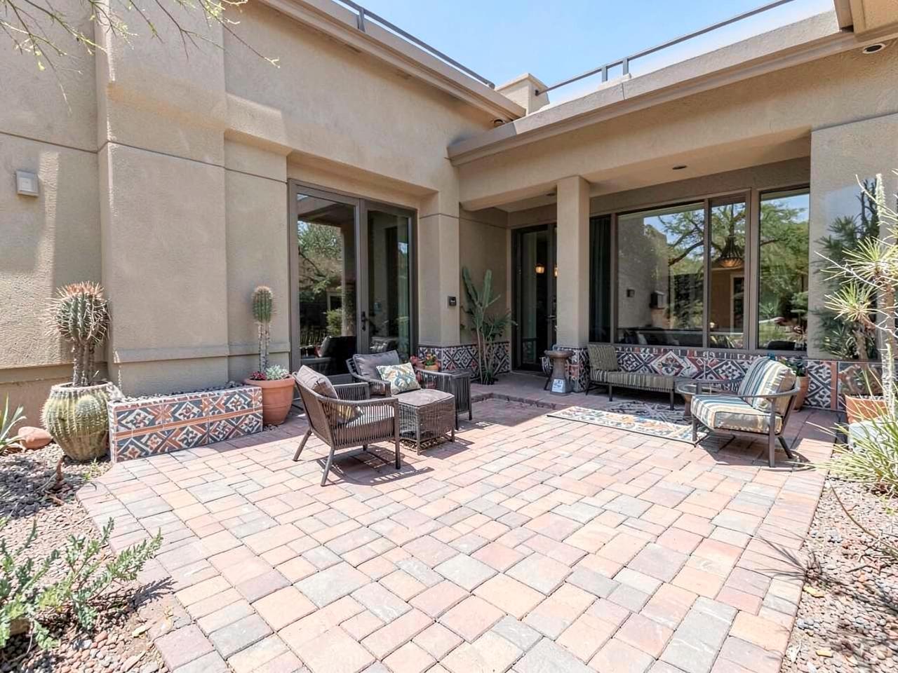 Paver patio hardscape with decorative border installed at a Phoenix Arizona home